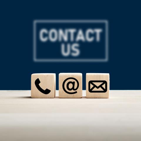 phone, email and mail icons under the words Contact Us 