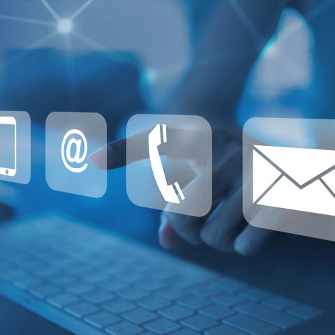 Digital interface with icons of a globe, smartphone, at symbol, telephone, and envelope.